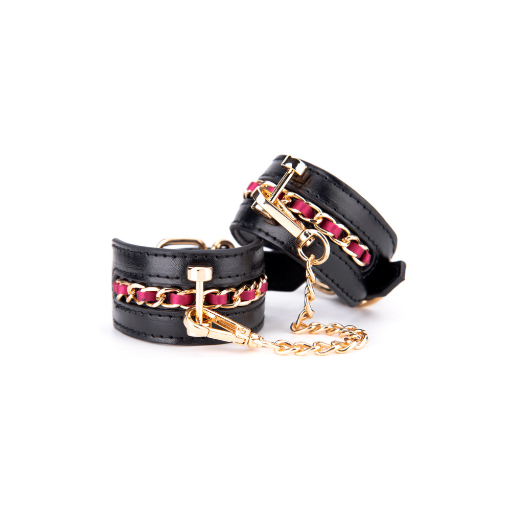 Elegante Leder-Handfesseln mit goldener Kette